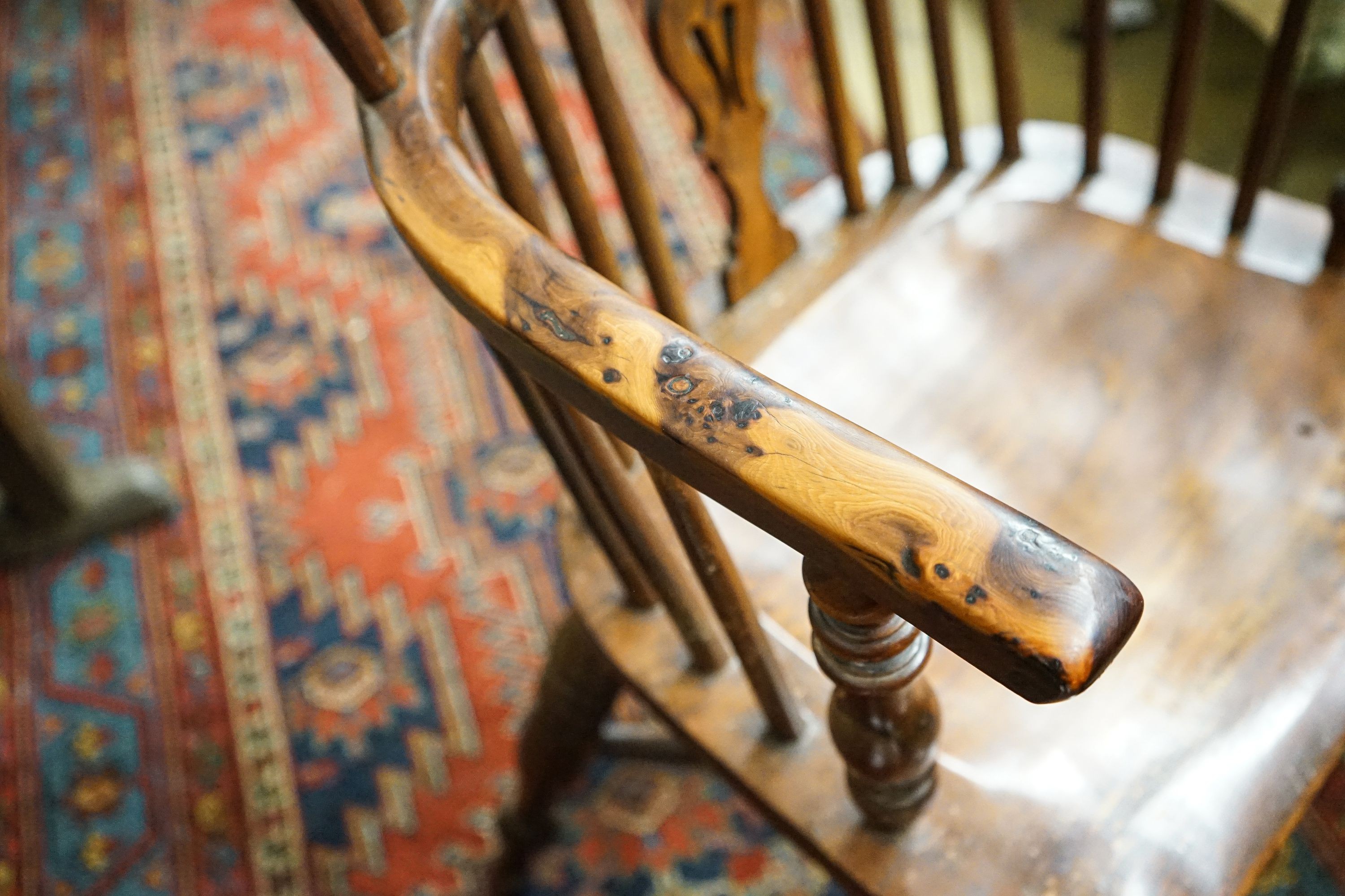 A harlequin set of four Victorian Windsor chairs, comprising near pair of yew, beech and elm, with crinoline stretchers and two others in oak, elm and ash with H stretchers